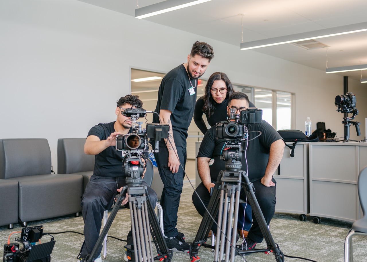 The Oh Yes Communications crew on set with cameras
